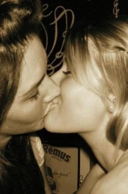 Hot lesbian GFs kissing each other on holiday